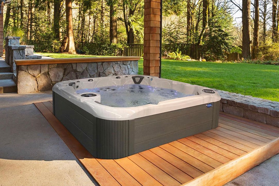 Coast Spas Hot Tubs And Swim Spas Decked Out Home Hearth And Patio
